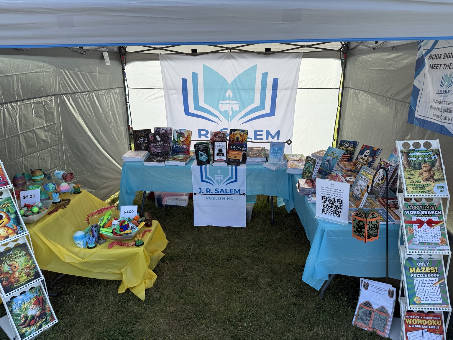 J. R. Salem Publishing booth filled with colorful books for children and adults