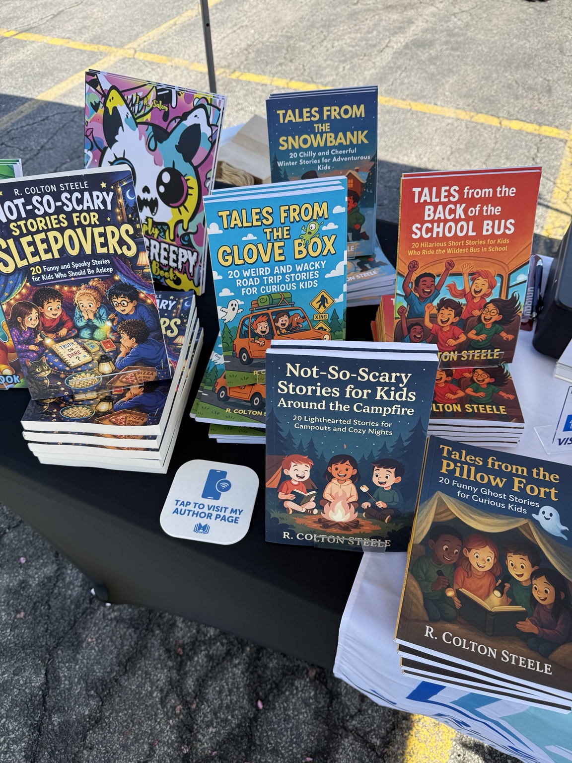 A colorful display of Wherever We Go story collections for children